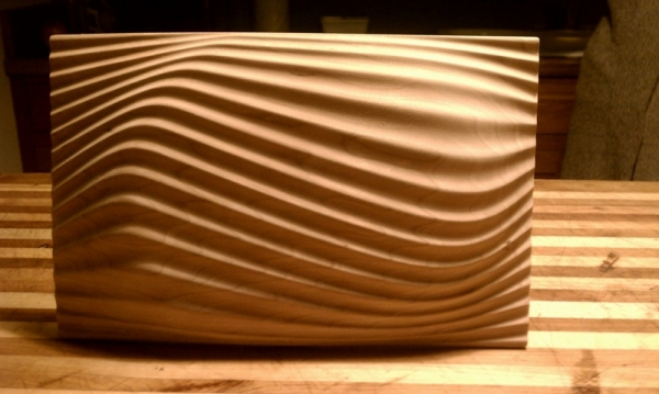 Carved waves on cherry wood
